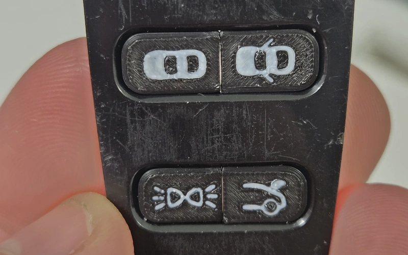 Replacement Aston Martin key buttons created with CAD and FDM