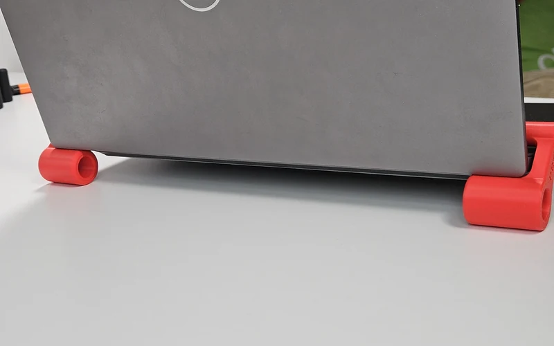 Preview card image for the clip-on laptop riser feet project.