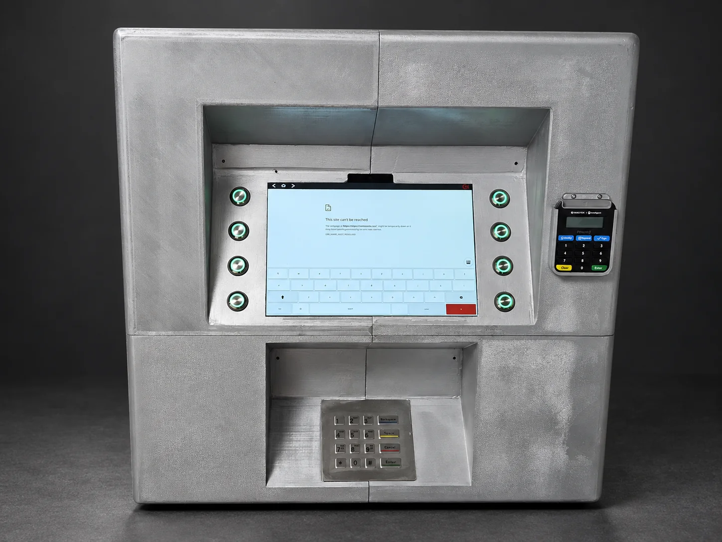 AI-assisted cover of the assembled grey kiosk with its tablet, illuminated buttons, keypad and authentication-device holder.