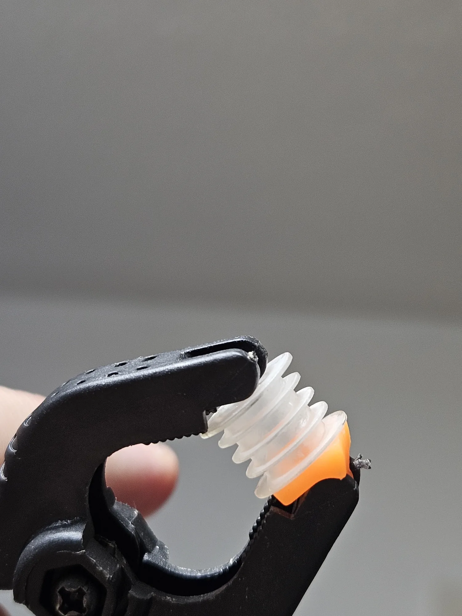 A coil bobbin printed in clear photopolymer resin.