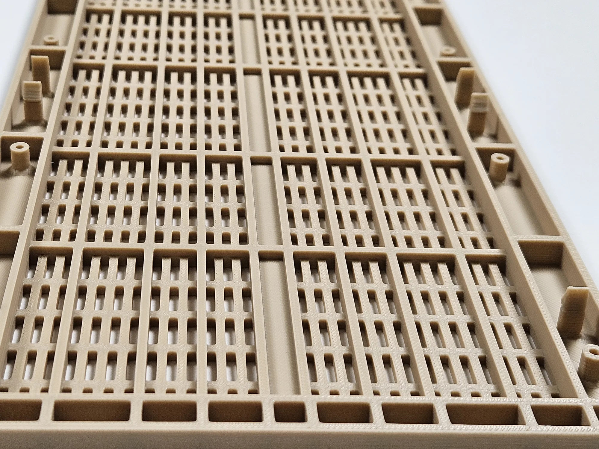 Rear side of the replacement radio cover showing internal ribs and mounting details.