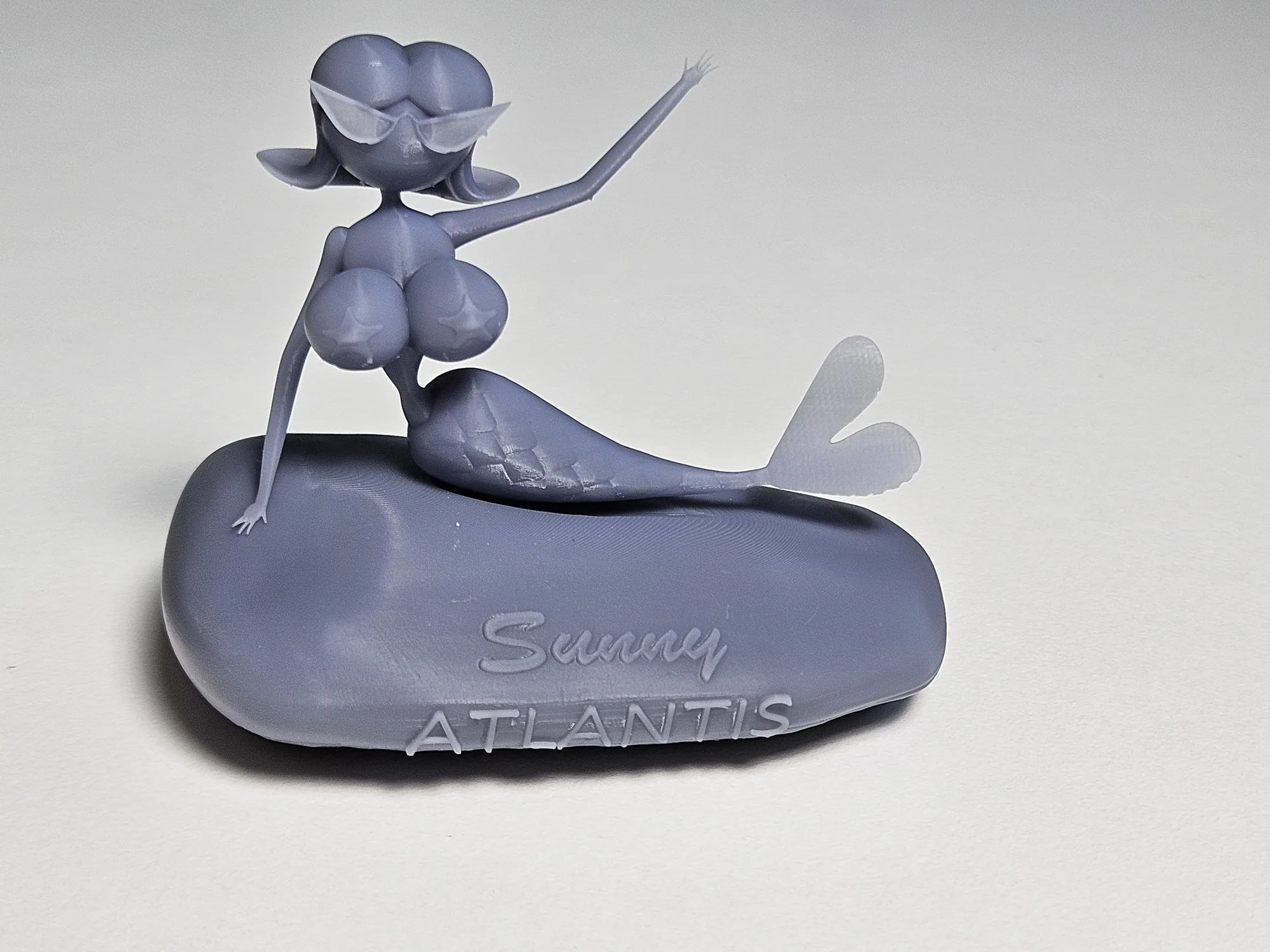 Sunny Atlantis resin miniature shown from the front.